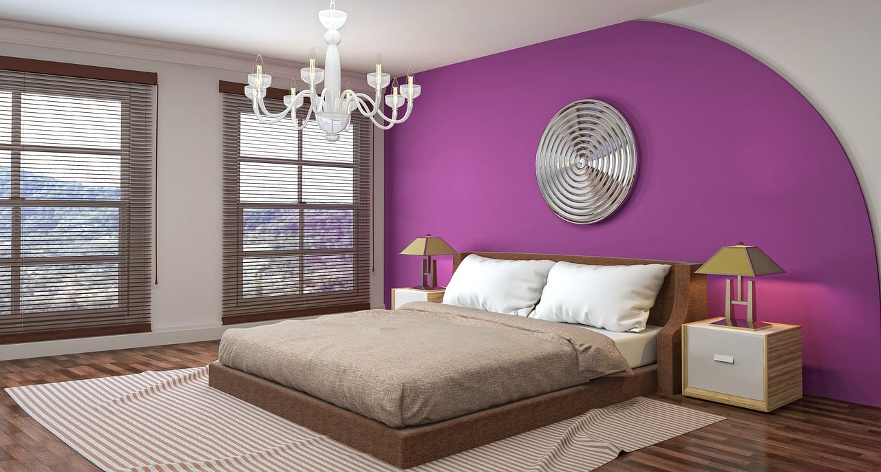 Modern Bedroom with Bold Magenta Accent Wall and Elegant Lighting.
