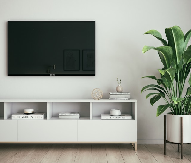 Modern Minimalist TV Cabinet with Open Shelves and Storage Drawers.